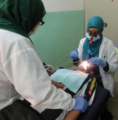 Dentists with patient